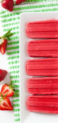 This dynamic phone live wallpaper perfectly captures the essence of springtime with its vibrant and colorful popsicles and freshly picked strawberries
