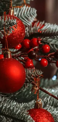 This Christmas tree live wallpaper is packed with festive cheer