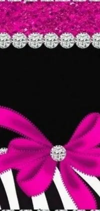 This live wallpaper features a bold zebra print ribbon with a feminine pink bow