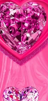 This digital art live wallpaper features a stunning diamond in the shape of a heart on a vibrant pink background