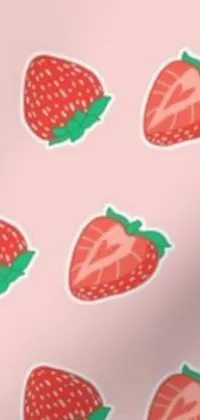 This stunning live wallpaper features a beautiful pattern of strawberries on a vibrant pink background