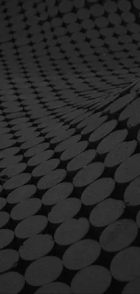 Stunning black and white live wallpaper featuring laser cut circles on a felt-like textured surface