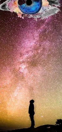Adorn your phone screen with a mesmerizing live wallpaper featuring a beautiful silhouette of a person standing atop a hill under a sky full of stars