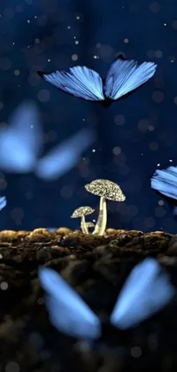 This phone live wallpaper features digital art of blue butterflies flying around a mushroom, with glowing crystals on the ground adding a touch of magic
