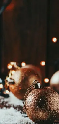 This Christmas live wallpaper features a stunning close-up of a holiday ornament on a table