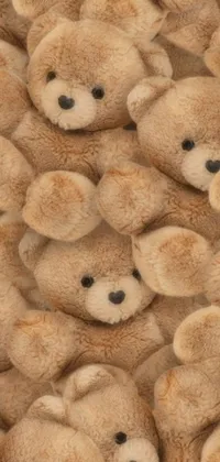 This live wallpaper depicts a close-up view of a group of brown teddy bears made from soft cotton fabric