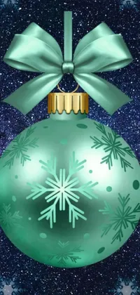 This phone live wallpaper showcases a stunning green Christmas ornament with a bow and snowflakes in a digital art style