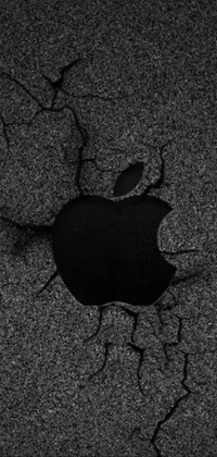 Looking for an edgy live phone wallpaper? Look no further than this black and white cracked apple logo wallpaper