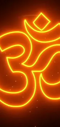 This live wallpaper boasts a vibrant orange-yellow glowing om symbol against a dark backdrop, accompanied by an image of the Hindu god