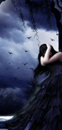 This phone live wallpaper features a haunting digital art creation of a woman wearing a gothic dress