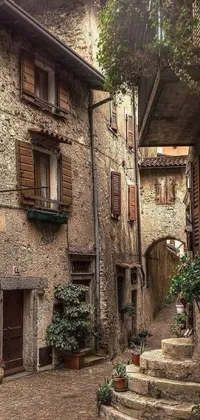 Experience the charm of a narrow alley with stone buildings and lush greenery through this beautiful live wallpaper