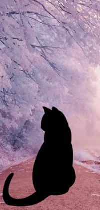 This captivating phone live wallpaper showcases an enchanting black cat seated serenely on a road amidst a snow-covered, pink forest