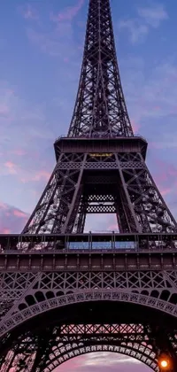 Enhance your phone with the beauty of the Eiffel Tower Sunset Live Wallpaper