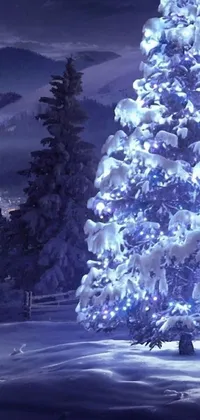 Get in the holiday spirit with this amazing phone live wallpaper! Enjoy the serene beauty of a snowy field adorned with a stunning lighted Christmas tree