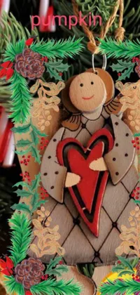 This live wallpaper captures the spirit of Christmas with a charming wooden angel ornament hanging from a tree