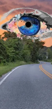 This striking phone live wallpaper features a surrealist depiction of an eye floating above a winding country road in West Virginia