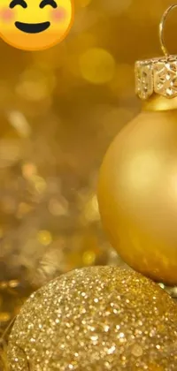 Enhance your phone's screen with the Gold Christmas Ornament Live Wallpaper