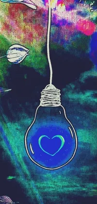 This live phone wallpaper depicts a vibrant light bulb with a heart inside of it set against a bold, psychedelic blue and green background