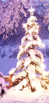 A charming live wallpaper for your phone featuring two snowmen beside a beautifully decorated Christmas tree in a serene outdoor setting