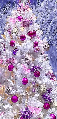 Experience the joy of the holiday season right on your phone with this stunning live wallpaper! Featuring a beautifully designed white Christmas tree adorned with pretty pink and silver ornaments, this digital masterpiece is sure to bring a smile to your face