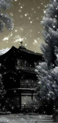 This live phone wallpaper features a snowy white building surrounded by an infrared-colored background inspired by Sesshū Tōyō