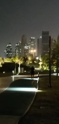 This phone live wallpaper depicts a city skyline at night, with elegant walkways leading between towering skyscrapers