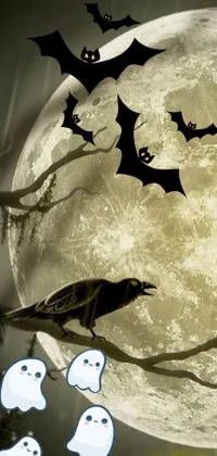 This live phone wallpaper features a group of bats flying in front of the full moon