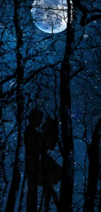 This dark and romantic live wallpaper features a couple kissing in the woods under a full moon