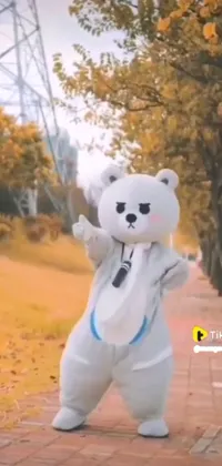 Get ready for an adorable live wallpaper with a beautiful white teddy bear, standing on its hind legs