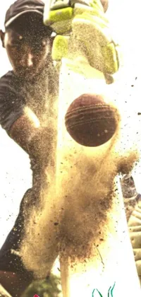 This vibrant phone live wallpaper features closeup imagery of a batter hitting a ball with a bat in a cricket game