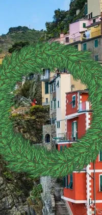 This phone live wallpaper displays a wreath on the edge of a building that has been inspired by environmental art