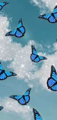 This phone live wallpaper showcases a group of blue butterflies flying gracefully in the sky