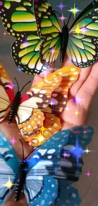 This phone live wallpaper features three vibrant and colorful butterflies that flutter on your screen in a mesmerizing motion