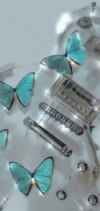 Brighten up your phone screen with this stunning live wallpaper featuring a close-up of a guitar adorned with delicate butterflies