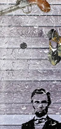 This dynamic live wallpaper features an eye-catching painting of a man with a pistol in front of a wooden wall
