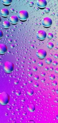 This phone live wallpaper features water droplets on a surface with a digital art of liquid purple metal in pink and blue gradients