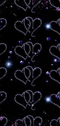 This live wallpaper features a sparkling black background adorned with hearts and stars made of shimmering blue diamonds, crystals, and scissors in 720p resolution