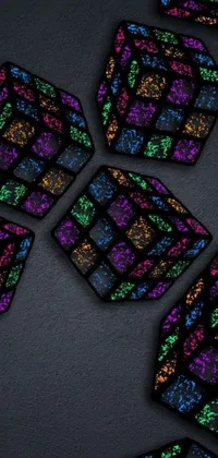 This multicolored coaster phone live wallpaper is a visual delight for your phone