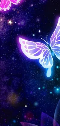 Get a stunning live wallpaper for your phone with this mesmerizing scene of delicate butterflies gracefully fluttering beneath a deep, dark sky in shades of blue and purple