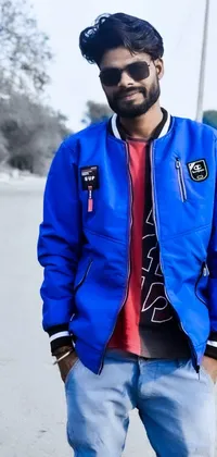 Get this stunning live wallpaper for your phone and liven up your home screen with an image of a handsome young black man dressed in a vibrant blue jacket