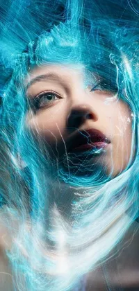 This stunning phone live wallpaper features a portrait of a woman with flowing blue hair