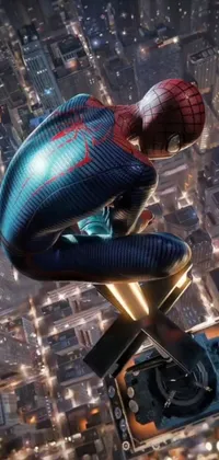 This phone live wallpaper features the iconic superhero, Spider-Man, in a kneeling position on a skyscraper