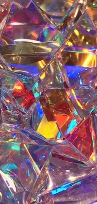 This live phone wallpaper features a pile of glass cubes on a table