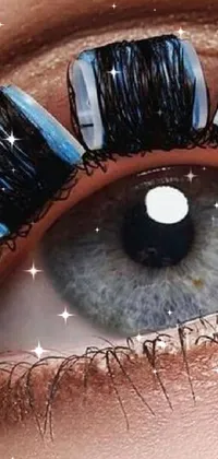 Looking for a unique and immersive visual experience for your phone? Check out this live wallpaper with a hyperrealistic painting effect, featuring a close-up of a person's eye in a blue and black color scheme
