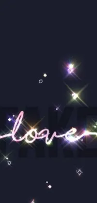 Looking for a stunning live wallpaper to add some personality to your phone? Check out this unique neon sign that spells out "love" against a dark background