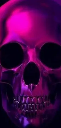 Get ready to add a bold and edgy touch to your phone screen with this captivating closeup of a skull
