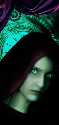 This live phone wallpaper features a stunning digital rendering of a hooded figure with jade eyes, set against a clock