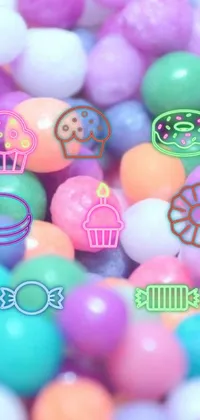 Get ready to satisfy your sweet tooth with the Candy Pile Live Wallpaper! This stunning phone wallpaper showcases a colorful and vibrant pile of candy on a table
