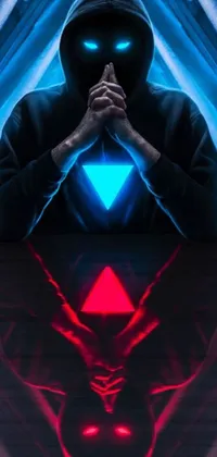 This stunning phone live wallpaper showcases a man in a hoodie sitting at a table in digital art form