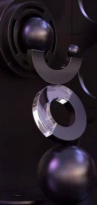 This phone live wallpaper features a stunning metal object with technological rings and patterns floating on top of a table